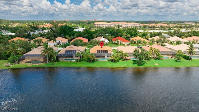 bird's eye view with a water view