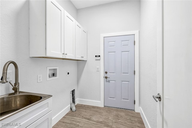 laundry room with cabinets, hookup for a washing machine, sink, and electric dryer hookup