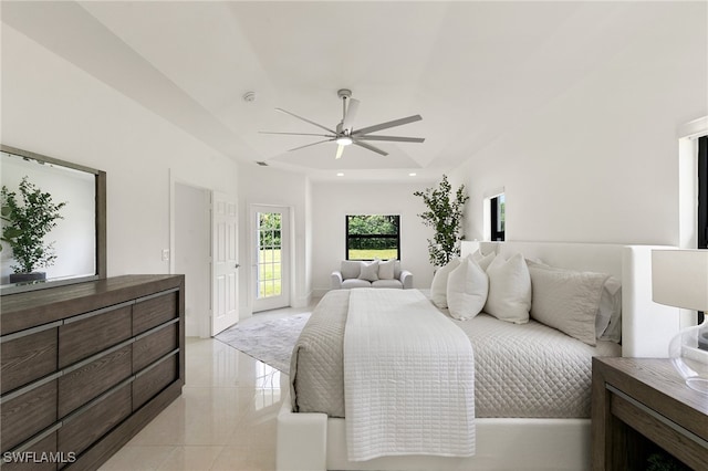 bedroom with access to outside and ceiling fan