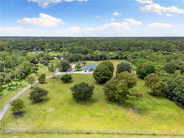 birds eye view of property with a rural view