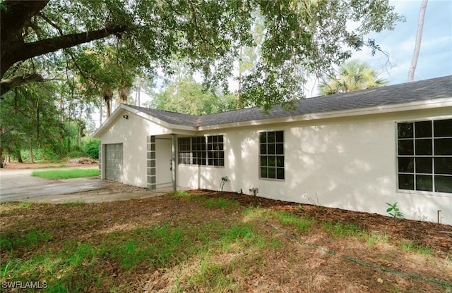 exterior space featuring a garage