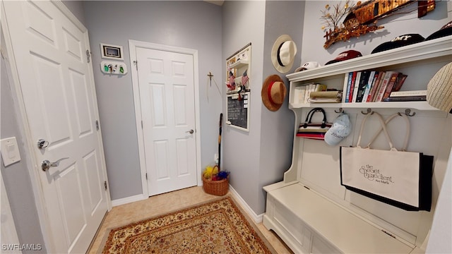 mudroom featuring baseboards