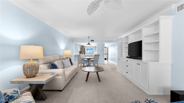 living room featuring light carpet, crown molding, and built in features