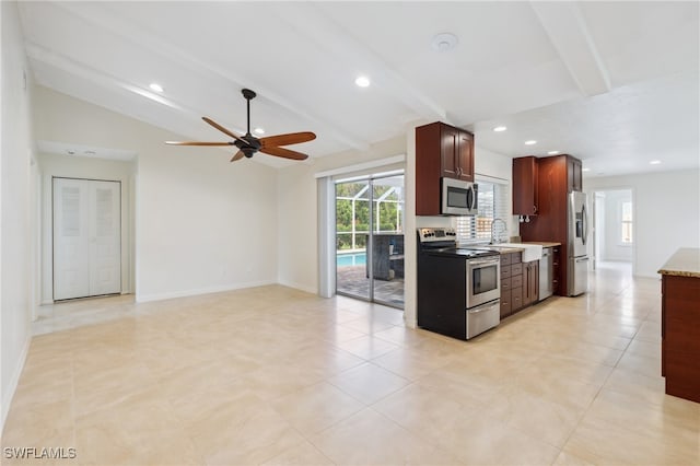 kitchen featuring lofted ceiling with beams, light tile patterned floors, stainless steel appliances, and ceiling fan