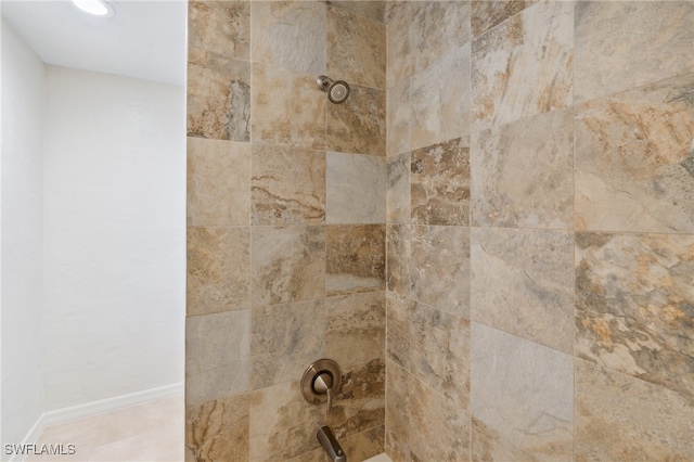 room details with a tile shower