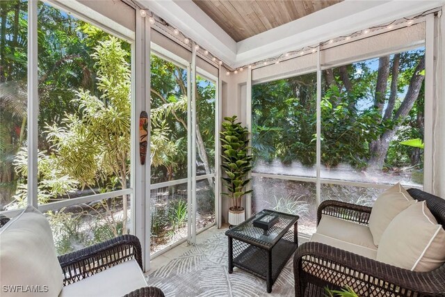 sunroom with wood ceiling