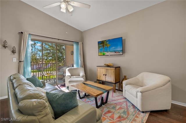 living room featuring hardwood / wood-style floors, ceiling fan, and vaulted ceiling