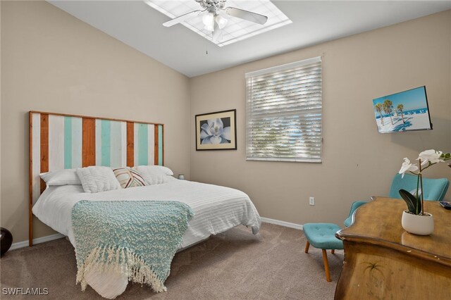 bedroom featuring ceiling fan, vaulted ceiling, and carpet floors