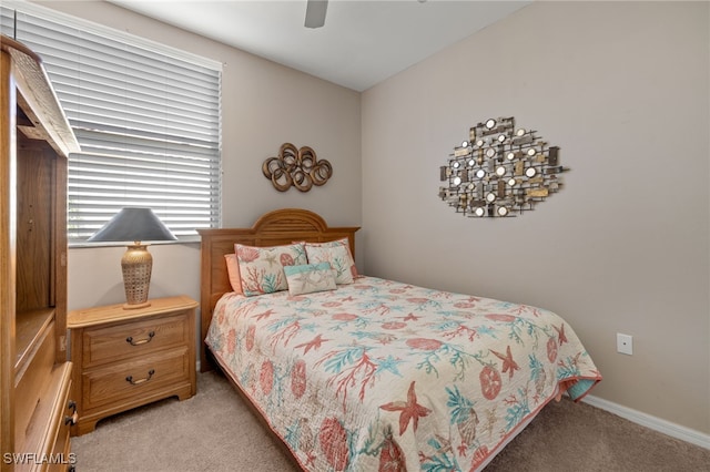 bedroom with ceiling fan and carpet flooring