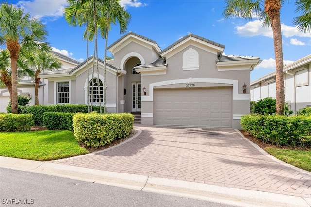 view of front of house with a garage