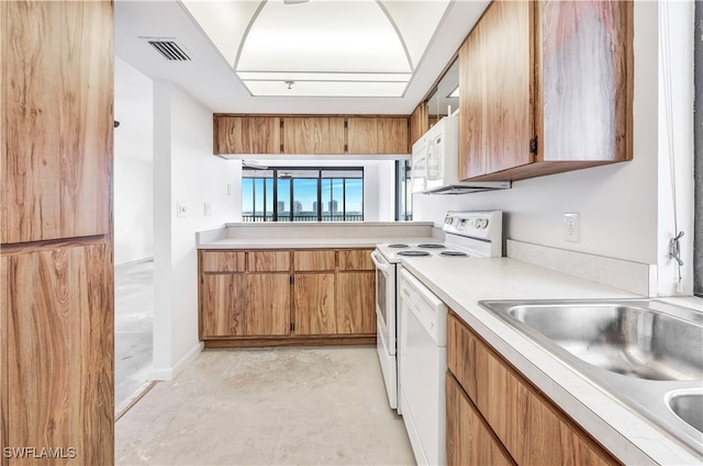 kitchen with sink and white appliances