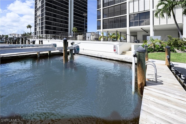 dock area featuring a water view