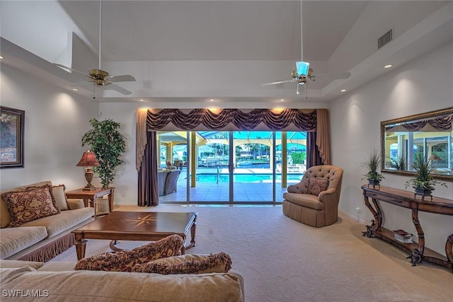 living area with recessed lighting, visible vents, carpet floors, and a ceiling fan