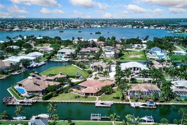 aerial view featuring a residential view and a water view