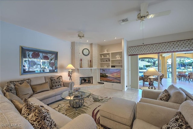 living area with light tile patterned floors, visible vents, recessed lighting, a fireplace, and ceiling fan