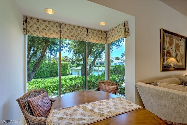 dining room featuring plenty of natural light