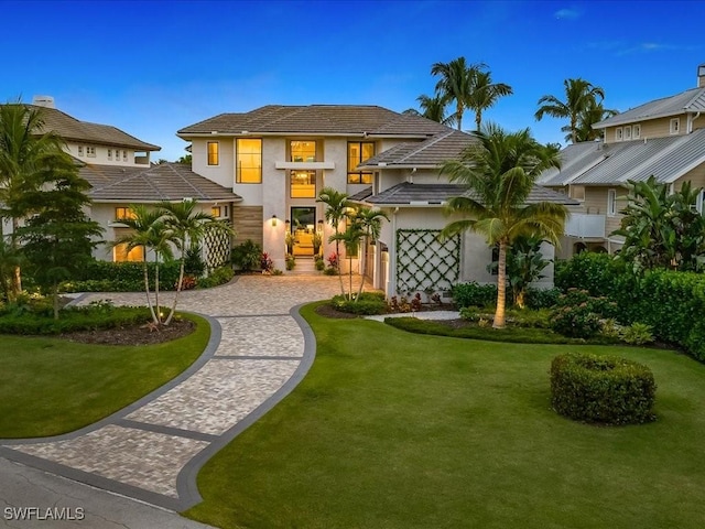 view of front of house with a front lawn