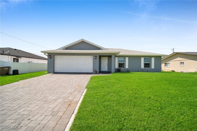 ranch-style house with a garage and a front lawn