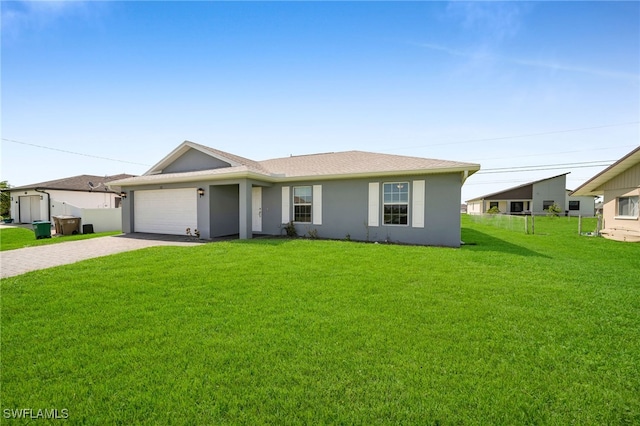 single story home with a garage and a front yard