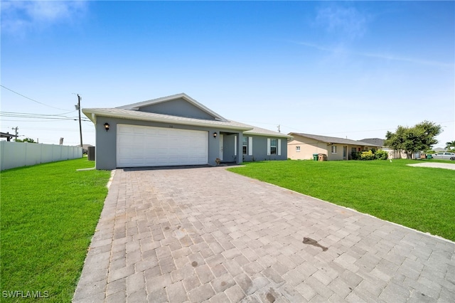 ranch-style home with a garage and a front yard