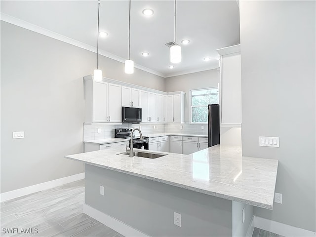 kitchen with pendant lighting, sink, white cabinetry, kitchen peninsula, and black appliances