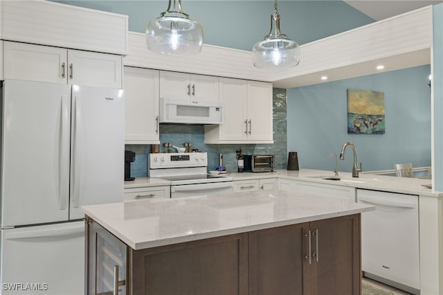 kitchen with white cabinetry, white appliances, beverage cooler, sink, and decorative backsplash