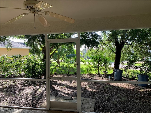 view of patio / terrace featuring ceiling fan