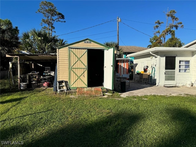 view of outbuilding featuring a yard