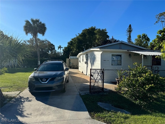 view of property exterior featuring a yard