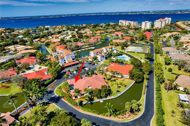 drone / aerial view featuring a water view