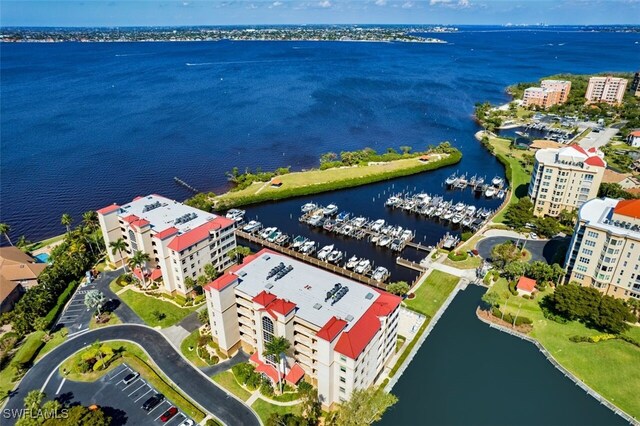 bird's eye view with a water view