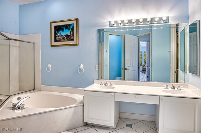 full bathroom with vanity, toilet, separate shower and tub, and tile patterned floors