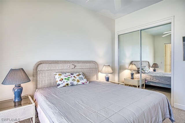 bedroom featuring carpet flooring, a closet, and ceiling fan