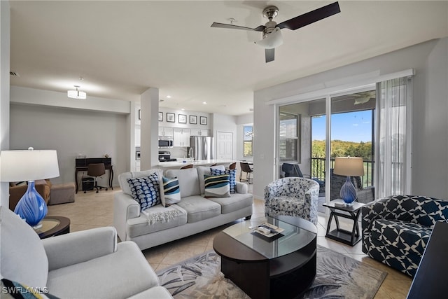 tiled living room featuring ceiling fan