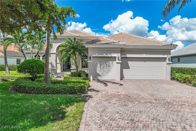 view of front of property featuring a garage