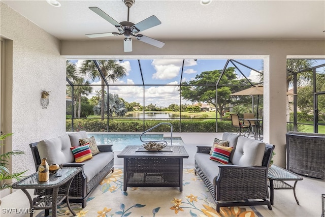 view of patio / terrace featuring an outdoor living space, a lanai, and ceiling fan