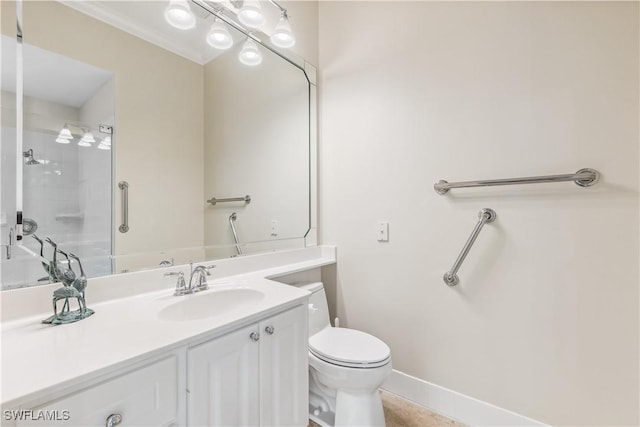 bathroom featuring vanity, toilet, and a shower with door