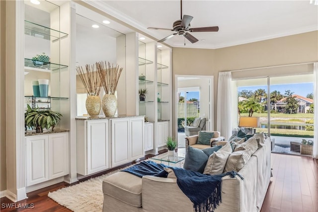 sunroom featuring ceiling fan