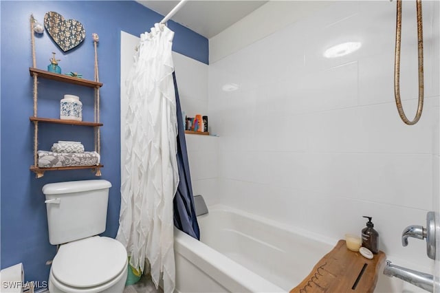 bathroom with shower / tub combo with curtain and toilet