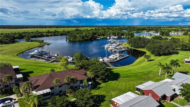 drone / aerial view with a water view