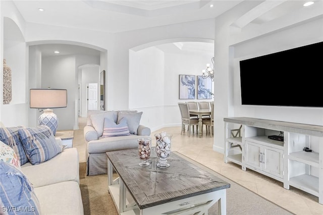 living area with an inviting chandelier, light tile patterned floors, recessed lighting, and baseboards