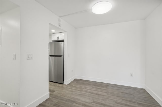 empty room featuring light hardwood / wood-style flooring