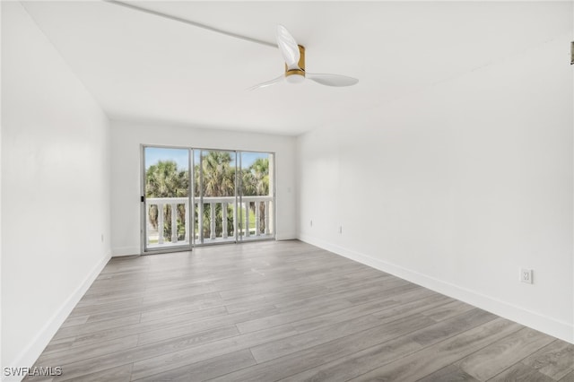 spare room with ceiling fan and light hardwood / wood-style floors