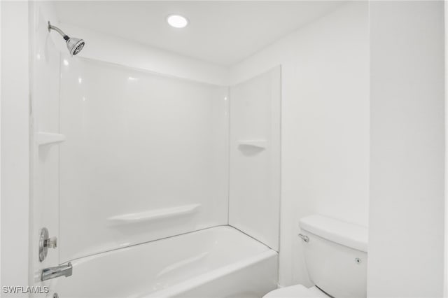 bathroom with shower / bathtub combination and toilet