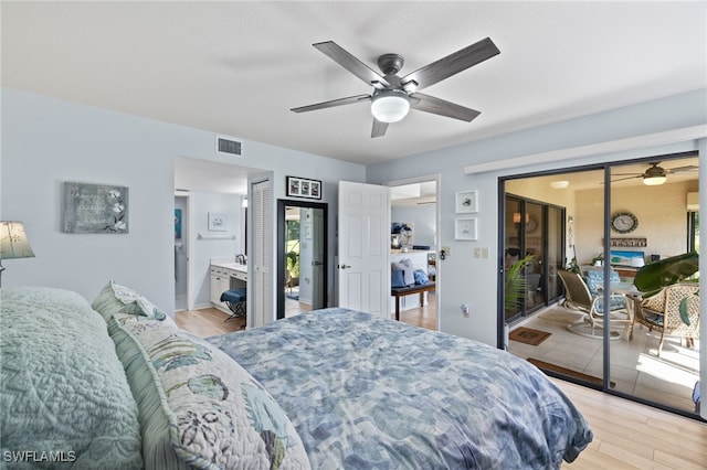 bedroom with ceiling fan, light hardwood / wood-style flooring, and ensuite bathroom