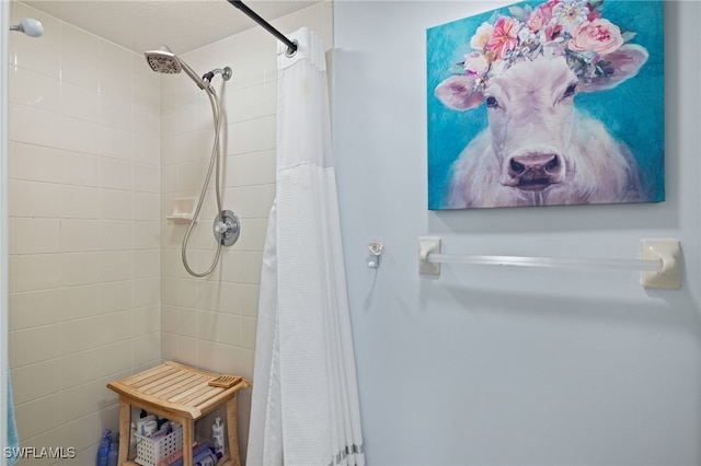 bathroom featuring a shower with curtain