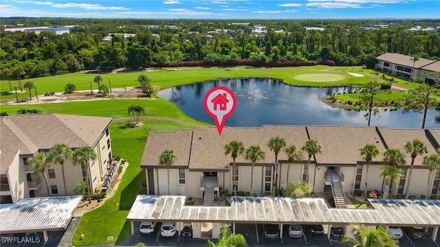 drone / aerial view with a water view