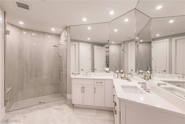 full bathroom featuring a stall shower, vanity, visible vents, and recessed lighting