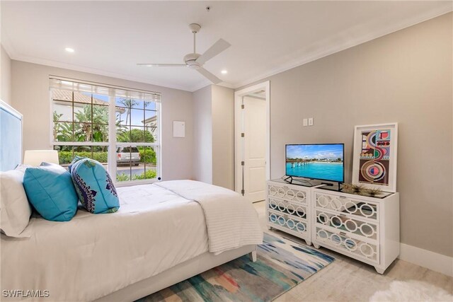 bedroom featuring ceiling fan, ornamental molding, and light carpet