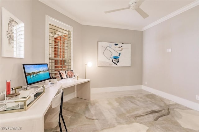 office space featuring baseboards, ornamental molding, and a ceiling fan